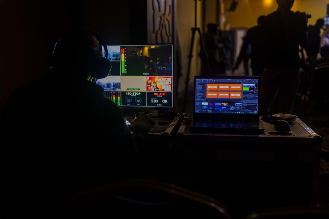Video producer directing a live stream from a mobile production console